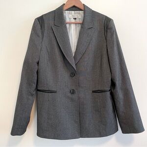 Tahari grey formal suit jacket with leather details.